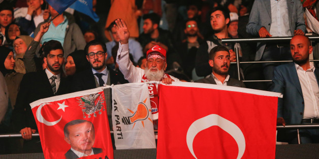 People cheer and wave flags during the Extraordinary Congress of the ruling AK Party (AKP) in Ankara, Turkey, May 21, 2017. REUTERS/Murad Sezer