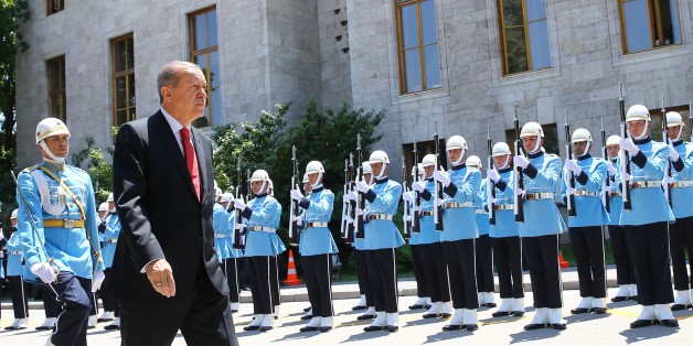 ANKARA, TURKEY - JULY 15: Turkish President Recep Tayyip Erdogan (front) walks past the honor guards during a welcoming ceremony as he arrives to attend the General Assembly of the Parliament, as part of the July 15 Democracy and National Unity Day, at Grand National Assembly of Turkey (TBMM), in Ankara, Turkey on June 15, 2017. (Photo by Kayhan Ozer/Anadolu Agency/Getty Images)