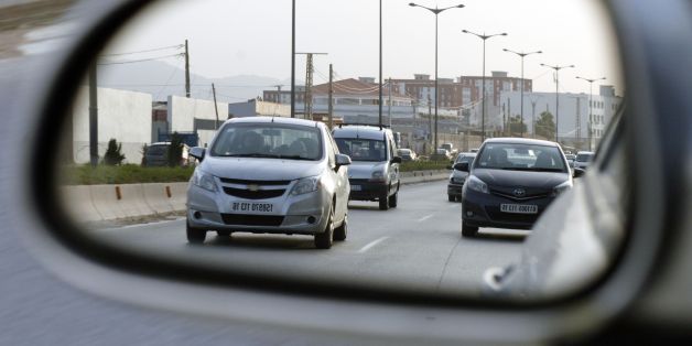 Cars drive on a road in the Algerian capital Algiers on February 1, 2017. / AFP / STRINGER (Photo credit should read STRINGER/AFP/Getty Images)