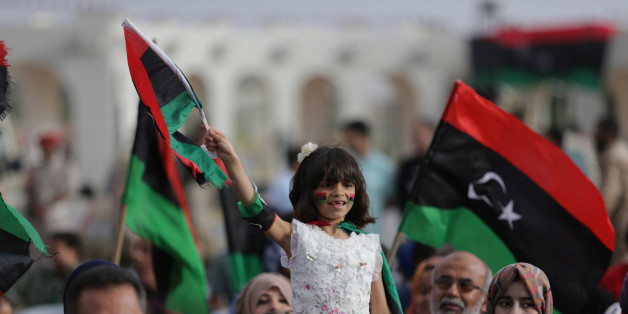 A girl holds a Libyan flag during celebrations marking the third anniversary of Libyan National Army's ÃDignityà operation against Islamists and other opponents, in Benghazi, Libya May 16, 2017. REUTERS/Esam Omran Al-Fetori