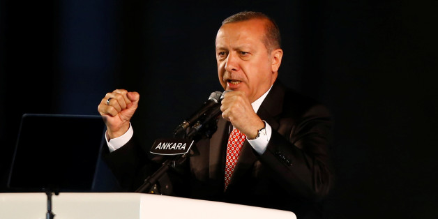 Turkey's President Tayyip Erdogan addresses his supporters during a ceremony marking the first anniversary of the attempted coup in front of the Turkish Parliament in Ankara, Turkey July 16, 2017. REUTERS/Umit Bektas