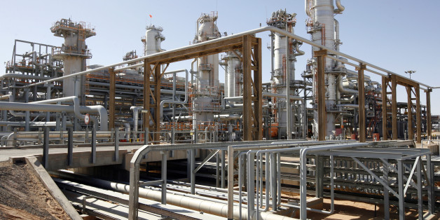 ALGERIA - DECEMBER 14: The In Salah Gas (ISG) Krechba Project, run by Sonatrach, British Petroleum (BP), and StatoilHydro, operates in the Sahara desert near In Salah, Algeria, on Sunday, Dec. 14, 2008. From produced gas, the carbon capture plant, the largest and first of its kind, removes annually the carbon dioxide emissions equivalent of 200,000 automobiles running 30,000 kilometers. The CO2 is then reinjected into a two-kilometer deep reservoir instead of the atmosphere, with the intention