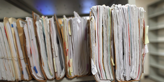 IRVING, TX - AUGUST 22: Folders with immigrants' applications for permanent U.S. residency sit stacked in the U.S. Citizenship and Immigration Services (USCIS), Dallas Field Office on August 22, 2016 in Irving, Texas. The USCIS processes millions of such 'green card' applications every year, with many of immigrant applicants in route to becoming American Citizens. (Photo by John Moore/Getty Images)