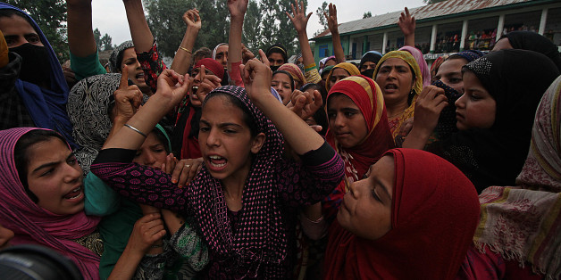 INDIA - 2017/07/18: Girls shout pro freedom slogans during the funeral of Showkat Ahmad Lohar a rebel of Lashkar-e-Toiba rebel outfit in south Kashmir's Bijbehara some 45 kilometers from Srinagar the summer capital of Indian controlled Kashmir on July 18, 2017. Showkat was killed with two other rebels when government forces ambushed the rebels in south Kashmir's Anantnag.
funeral, death, mourning, conflict, war. (Photo by Faisal Khan/Pacific Press/LightRocket via Getty Images)