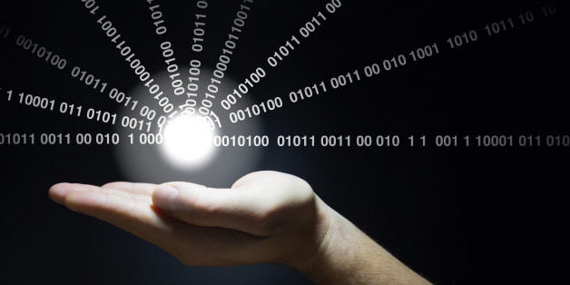Hand holds a glowing ball emitting datastreams