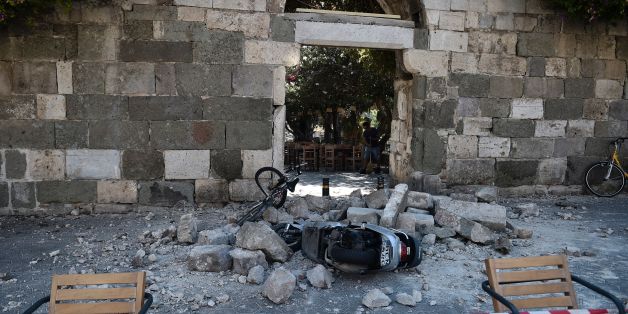 A man sweeps away rubble following on the Island of Kos following a 6.5 magnitude earthquake which struck the region early on July 21, 2017.
Two foreigners died and more than 100 people were injured on the Greek island of Kos when an earthquake shook popular Greek and Turkish holiday destinations in the Aegean Sea. The epicentre of the 6.7 magnitude quake was some 10.3 kilometres (6.4 miles) south of the major Turkish resort of Bodrum, a magnet for holidaymakers in the summer, and 16.2 kilometres east of the island of Kos in Greece, the US Geological Survey said. / AFP PHOTO / LOUISA GOULIAMAKI (Photo credit should read LOUISA GOULIAMAKI/AFP/Getty Images)