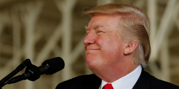 U.S. President Donald Trump participates in the commissioning ceremony of the aircraft carrier USS Gerald R. Ford at Naval Station Norfolk in Norfolk, Virginia, U.S. July 22, 2017. REUTERS/Jonathan Ernst