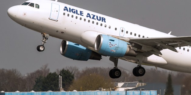 An Airbus A318 airplane of the French airline Aigle Azur takes off from Lille Airport in Lesquin on April 10, 2015. AFP PHOTO / PHILIPPE HUGUEN (Photo credit should read PHILIPPE HUGUEN/AFP/Getty Images)