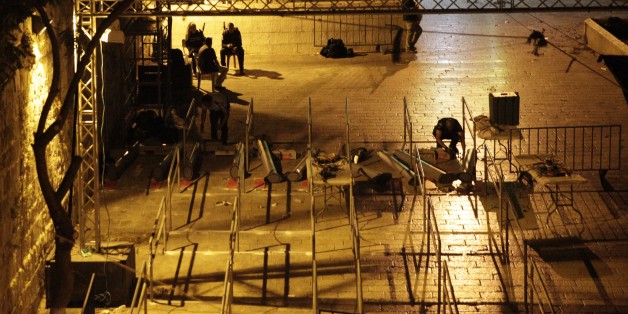 JERUSALEM - JULY 25: Israeli security forces remove the metal detectors at al-Esbat Gate of Al-Aqsa Mosque Compund in Jerusalem on July 25, 2017. Israeli authorities decided to use advanced technology instead of metal detectors and surveillance cameras in Al-Aqsa Mosque Compound (Photo by Mahmoud Ibrahim/Anadolu Agency/Getty Images)