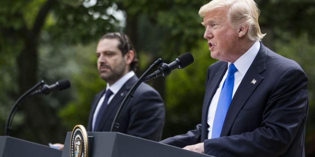 U.S. President Donald Trump, right, speaks as Saad Hariri, Lebanon's prime minister, listens during a joint press conference in the Rose Garden of the White House in Washington, D.C., U.S., on Tuesday, July 25, 2017. Trump said he's disappointed with Attorney General Jeff Sessions for recusing himself from investigations of Russian interference in the 2016 election, and that 'time will tell' if the nation's top law enforcement officer remains in his job. Photographer: Zach Gibson/Bloomb
