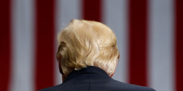 U.S. President Donald Trump holds a rally with supporters in an arena in Youngstown, Ohio, U.S. July 25, 2017. REUTERS/Jonathan Ernst TPX IMAGES OF THE DAY