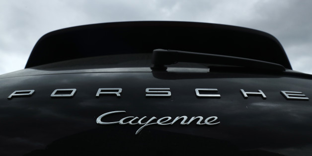 BERLIN, GERMANY - JUNE 13: A Porsche Cayenne diesel SUV stands parked on June 13, 2017 in Berlin, Germany. Spiegel magazine, after conducting independent tests on a Porsche Cayenne V6 diesel SUV, is accusing the company of using software built into the car's engine to detect when it is being tested for emissions. The magazine claims the car's emissions of nitrogen-oxides are substantially higher under real driving circumstances. The accusations come in the ongoing wake of investigations into Volkswagen, Porsche's parent company, over software that illegally manipulated the emissions of VW diesel cars and affected millions of car worldwide. (Photo by Sean Gallup/Getty Images)