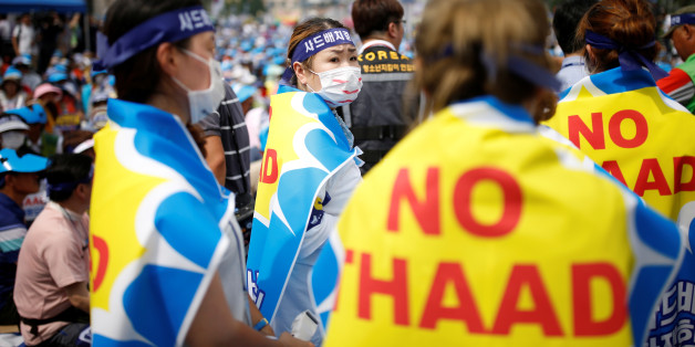Seoungju residents take part in a protest against the government's decision on deploying a U.S. THAAD anti-missile defense unit in Seongju, in Seoul, South Korea, July 21, 2016. REUTERS/Kim Hong-Ji