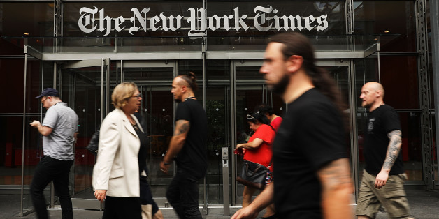 NEW YORK, NY - JULY 27: People walk past the New York Times building on July 27, 2017 in New York City. The New York Times Company shares have surged to a nine-year high after posting strong earnings on Thursday. Partly due to new digital subscriptions following the election of Donald Trump as president, the company reported a profit of $27.7 million in the second quarter, up from $9.1 million in the same period last year. (Photo by Spencer Platt/Getty Images)