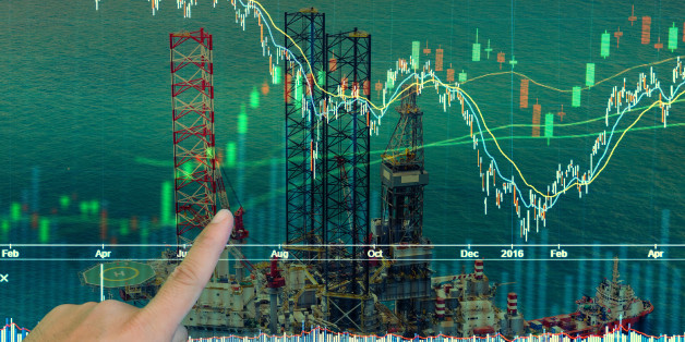Stock market concept with oil rig in the gulf and oil refinery industry background,Double exposure