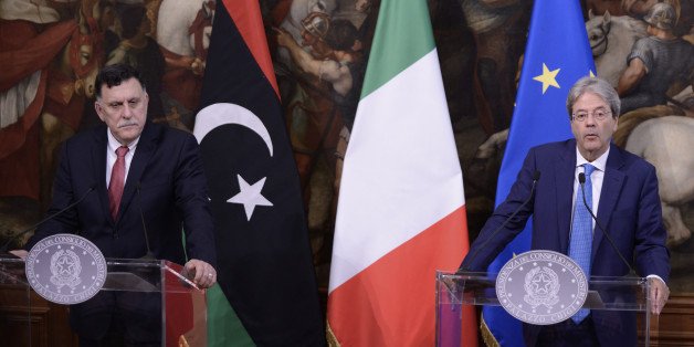 ROME, ITALY - JULY 26: Prime Minister Paolo Gentiloni with Libyan Prime Minister Fayez al-Sarraj at Palazzo Chigi on July 26, 2017 in Rome, Italy. Paolo Gentiloni has previously met with Fayez al-Sarraj to discuss migration and border control. (Photo by Simona Granati - Corbis/Corbis via Getty Images)