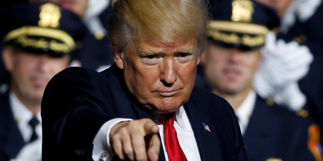 U.S. President Donald Trump concludes his remarks about his proposed U.S. government effort against the street gang Mara Salvatrucha, or MS-13, to a gathering of federal, state and local law enforcement officials in Brentwood, New York, U.S. July 28, 2017. REUTERS/Jonathan Ernst