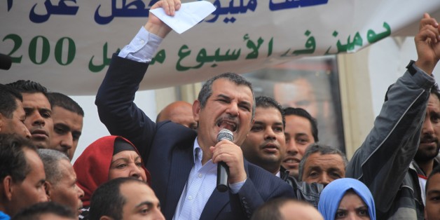 TUNIS, TUNISIA - OCTOBER 31: Leader of the Tayyar al-Mahhab Party, Hachmi Hamdi, gives a speech during a protest against Tunisian government's economical policies at Avenue Habib Bourguiba in Tunis, Tunisia on October 31, 2015. (Photo by Yassine Gaidi/Anadolu Agency/Getty Images)