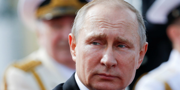 Russian President Vladimir Putin attends the Navy Day parade in St. Petersburg, Russia, July 30, 2017. REUTERS/Alexander Zemlianichenko/Pool