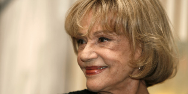 French actress Jeanne Moreau poses before being awarded Commandeur de la Legion d'Honneur during a ceremony at the Culture Ministry in Paris, January 9, 2007. REUTERS/Charles Platiau (FRANCE)