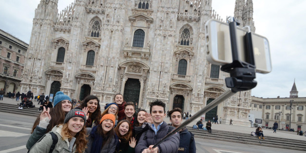 Selfies with the stick has been the trendy fashion 2014 in Italy but with the Expo 2015 in Milan sellers are expecting a booming business. (Photo by Alexandro Auler/Corbis via Getty Images)