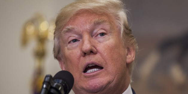WASHINGTON, DC - AUGUST 2: (AFP OUT) U.S. President Donald Trump makes an announcement on the introduction of the Reforming American Immigration for a Strong Economy (RAISE) Act in the Roosevelt Room at the White House on August 2, 2017 in Washington, DC. The act aims to overhaul U.S. immigration by moving towards a 'merit-based' system. (Photo by Zach Gibson - Pool/Getty Images)