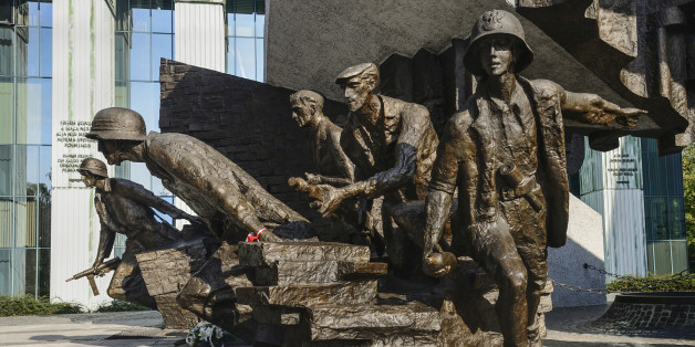 Poland, Warsaw, Monument to the Warsaw Uprising, another section of the monument showing a group of Polish insurgents actively engaged in combat.