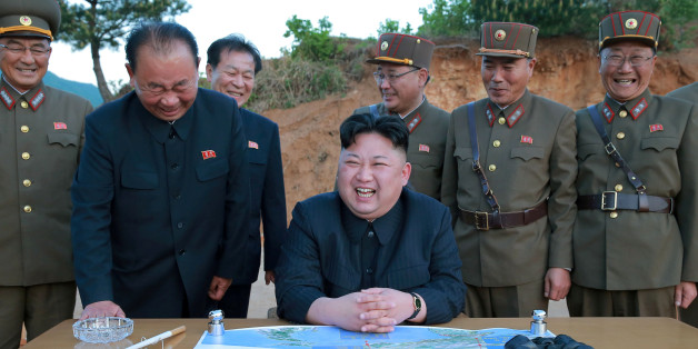 FILE PHOTO - North Korean leader Kim Jong Un reacts during the long-range strategic ballistic rocket Hwasong-12 (Mars-12) test launch in this undated photo released by North Korea's Korean Central News Agency (KCNA) on May 15, 2017. KCNA via REUTERS/File Photo REUTERS ATTENTION EDITORS - THIS IMAGE WAS PROVIDED BY A THIRD PARTY. REUTERS IS UNABLE TO INDEPENDENTLY VERIFY THIS IMAGE. NO THIRD PARTY SALES. SOUTH KOREA OUT.