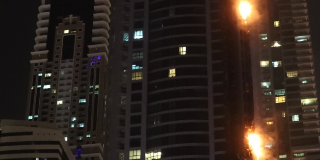 Fire is seen at the 1,105 foot tall Torch tower skyscraper on August 4, 2017 in Dubai. / AFP PHOTO / KARIM SAHIB (Photo credit should read KARIM SAHIB/AFP/Getty Images)