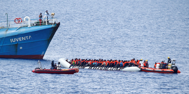 Migrants on a dinghy are rescued by German NGO Jugend Rettet ship "Juventa" crew in the Mediterranean sea, off the coast of Libya June 18, 2017. Picture taken June 18, 2017. REUTERS/Stefano Rellandini