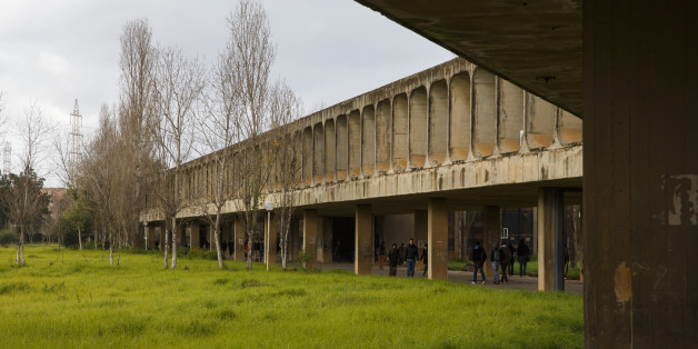 ALGIERS, ALGERIA - JANUARY 25: Students walk across campus of University of Sciences and Technology Houari Boumediene in January 25, 2015 in Algiers, Algeria. The university buildings were designed by architect Oscar Niemeyer (Photo by Thomas Trutschel/Photothek via Getty Images)