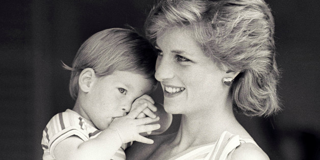 FILE PHOTO - Britain's Princess Diana holds Prince Harry during a morning picture session at Marivent Palace, where the Prince and Princess of Wales are holidaying as guests of King Juan Carlos and Queen Sofia, in Mallorca, Spain August 9, 1988. REUTERS/Hugh Peralta/File Photo
