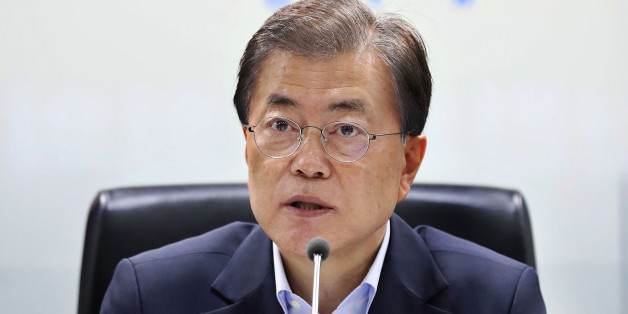SEOUL, SOUTH KOREA - JULY 04: In this handout photo released by the South Korean Presidential Blue House, South Korean President Moon Jae-in speaks as he presides over a meeting of the National Security Council at the presidential Blue House on July 4, 2017 in Seoul, South Korea. North Korea fired an unidentified ballistic missile on Tuesday from a location near the North's border with China into waters at Japan's exclusive economic zone, east of the Korean Peninsula, according to reports. The