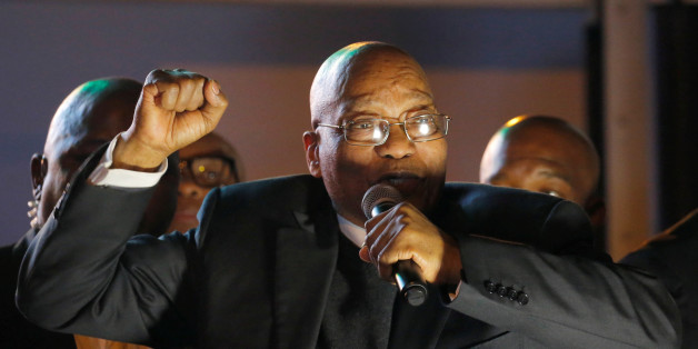 South Africa's President Jacob Zuma celebrates with his supporters after he survived a no-confidence motion in parliament in Cape Town, South Africa, August 8, 2017. REUTERS/Mike Hutchings