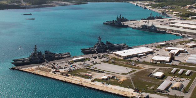 FILE PHOTO: Navy vessels are moored in port at the U.S. Naval Base Guam at Apra Harbor, Guam March 5, 2016. Major Jeff Landis,USMC (Ret.)/Naval Base Guam/Handout/File Photo via REUTERS. ATTENTION EDITORS - THIS IMAGE WAS PROVIDED BY A THIRD PARTY