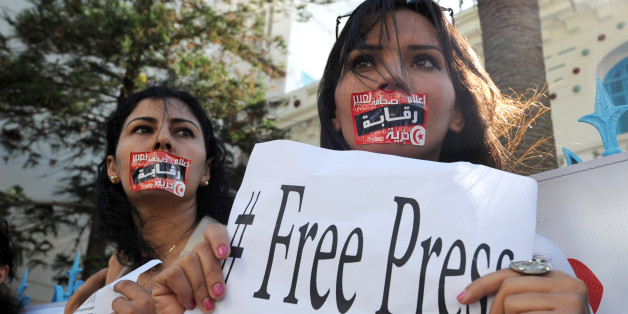 Tunisian Journalists protest during a strike on October 17, 2012 in the capital Tunis, after months of rising tensions with the Islamist-led government, which is accused of curbing press freedom and seeking to control public media groups. AFP PHOTO / FETHI BELAID (Photo credit should read FETHI BELAID/AFP/Getty Images)