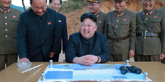 FILE PHOTO - North Korean leader Kim Jong Un reacts during the long-range strategic ballistic rocket Hwasong-12 (Mars-12) test launch in this undated photo released by North Korea's Korean Central News Agency (KCNA) on May 15, 2017. KCNA via REUTERS/File Photo REUTERS ATTENTION EDITORS - THIS IMAGE WAS PROVIDED BY A THIRD PARTY. REUTERS IS UNABLE TO INDEPENDENTLY VERIFY THIS IMAGE. NO THIRD PARTY SALES. SOUTH KOREA OUT.