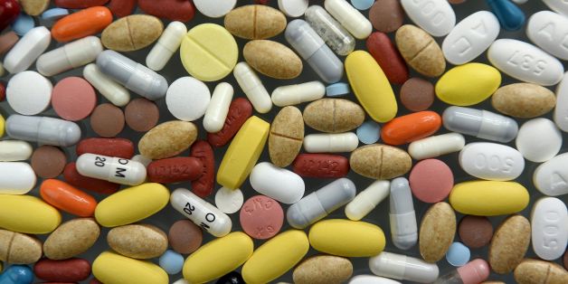 A picture taken on March 14, 2016 shows tablets and capsules in Paris displayed on a desktop for an illustration in Paris. / AFP / FRANCK FIFE (Photo credit should read FRANCK FIFE/AFP/Getty Images)