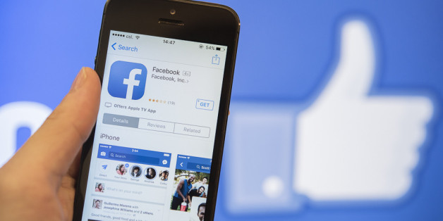 HONG KONG, HONG KONG - JULY 27: Startup screen of Facebook, the world's largest social networking site, is seen displayed on a phone on a laptop screen on 27 July 2017 in Hong Kong, Hong Kong. (Photo by studioEAST/Getty Images)