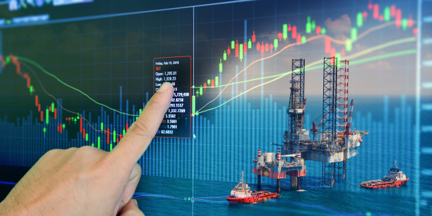 Stock market concept with oil rig in the gulf and oil refinery industry background,Double exposure
