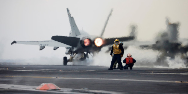A U.S. Navy F18 fighter jet takes off from the deck of U.S. aircraft carrier USS Carl Vinson during an annual joint military exercise called "Foal Eagle" between South Korea and U.S., in the Sea of Japan, South Korea, March 14, 2017. REUTERS/Kim Hong-Ji