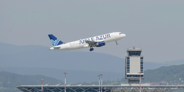 An Aigle Azur company airplane takes off from Mulhouse-Basel -Freiburg Euroairpot on June 19, 2013, in Saint-Louis (eastern France). AFP PHOTO / SEBASTIEN BOZON (Photo credit should read SEBASTIEN BOZON/AFP/Getty Images)