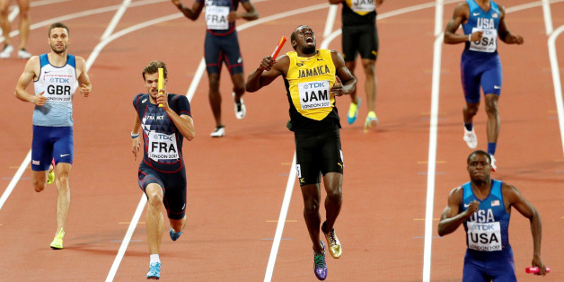 Athletics - World Athletics Championships - Men's 400 Metres Relay Final - London Stadium, London, Britain â August 12, 2017. Usain Bolt of Jamaica appears injured during the final. REUTERS/John Sibley TPX IMAGES OF THE DAY