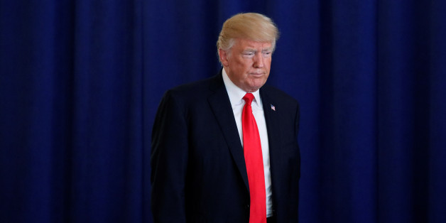 U.S. President Donald Trump arrives to deliver remarks on the protests in Charlottesville, Virginia, from his golf estate in Bedminster, New Jersey U.S. August 12, 2017. REUTERS/Jonathan Ernst