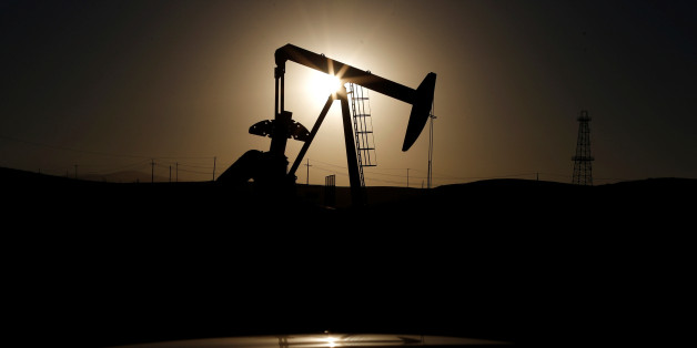 A pump jack is seen at sunrise near Bakersfield, California October 14, 2014. REUTERS/Lucy Nicholson/File Photo