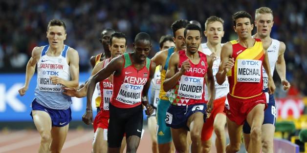 Athletics - World Athletics Championships â men's 1500 metres semi-final â London Stadium, London, Britain â August 11, 2017 â Abdalaati Iguider of Morocco, Adel Mechaal of Spain and Elijah Motonei Manangoi of Kenya compete. REUTERS/Lucy Nicholson