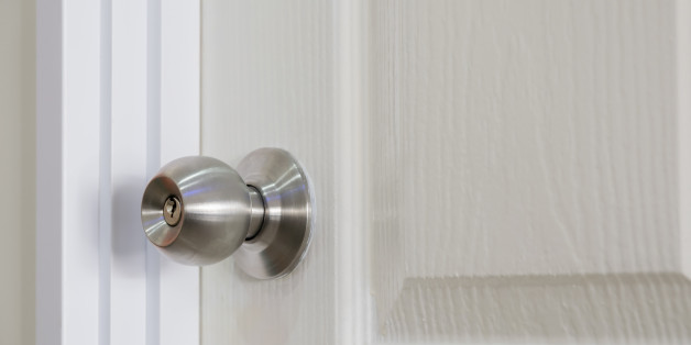 Closeup of spherical of stainless steel door knob.