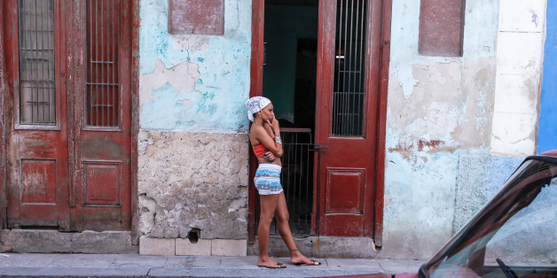 A young lady seen near her house entrance in Havana city center.
For a week I explored the streets of Havana, the homes and Havana's vastly diverse culture, just a few days after the death of the legendary leader Fidel Castro.
After news broke on Friday evening (the 25th November) that Fidel Castro had died, some people in Havana reacted in shock, disbelief, and pain. Others saw the former leader's death as an opportunity for the country.
On the same night, many people did not respond with any visible emotion when they were told of Fidel Castros death.
During the next few days that followed, many went about their days as usual, arguing that little would change because of Fidel Castros demise.
Much of Havana seemed and still seems uncertain about exactly how to feel, or at least how to talk about it.
On Friday, 2 December 2016, in Havana, Cuba. (Photo by Artur Widak/NurPhoto via Getty Images)