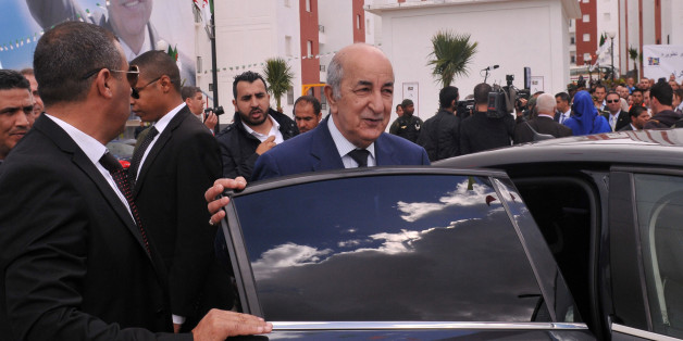 Algerian Housing minister Abdelmadjid Tebboune (C) is seen during the ceremony of social housing distribution in Algiers, Algeria April 3, 2017. Picture taken April 3, 2017. Tebboune was named as the new Prime Minister of Algeria on May 2017. REUTERS/ Ramzi Boudina