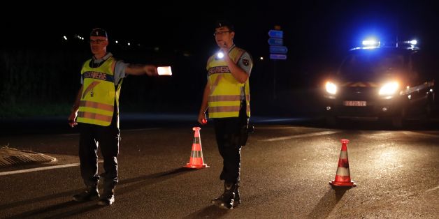 Police officers direct traffic on a road near the site where man smashed a car into a pizza restaurant in Sept-Sorts, 55km east of Paris, on August 14, 2017, killing a 13-year-old girl and seriously injuring four.
Investigators said the young driver had tried to commit suicide and the incident was not terror-related. The man, who was arrested, said 'he had tried to kill himself yesterday (August 13) without success and decided to try again this way,' a source close to the inquiry said. / AFP PHOTO / Thomas Samson (Photo credit should read THOMAS SAMSON/AFP/Getty Images)